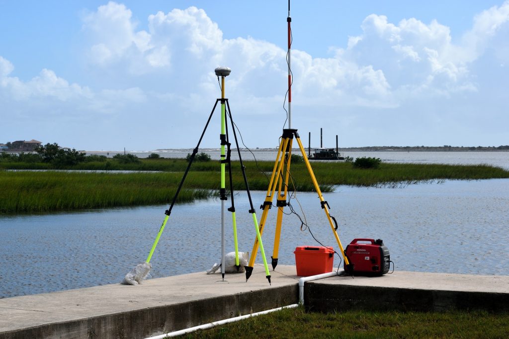 Surveying equipment by a river