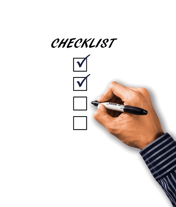 person doing a checklist