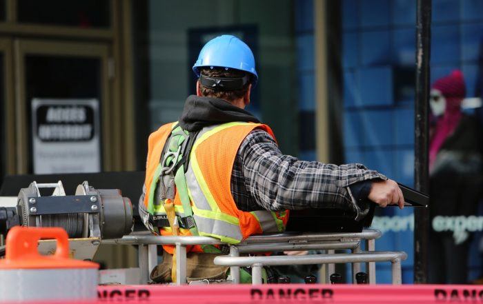 a construction worker inspecting commercial property