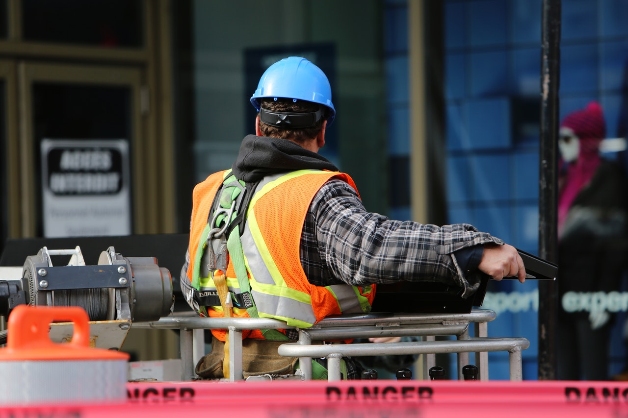 a construction worker inspecting commercial property