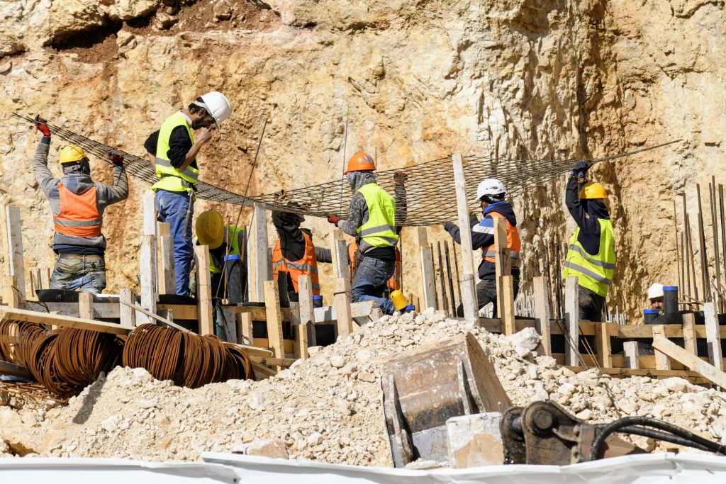 Men in hard hats at construction site