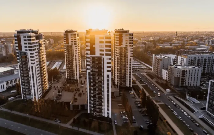 high angle photography of high rise buildings near road during golden hour