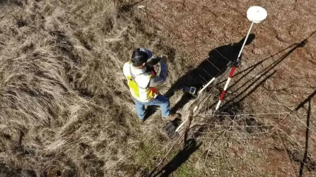 man doing land survey